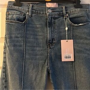 *Brand new! Denim star jeans with star shape on back.
